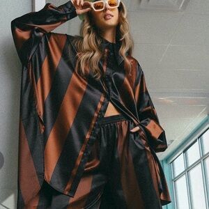 Dressed in LALA Black and Brown Striped top only